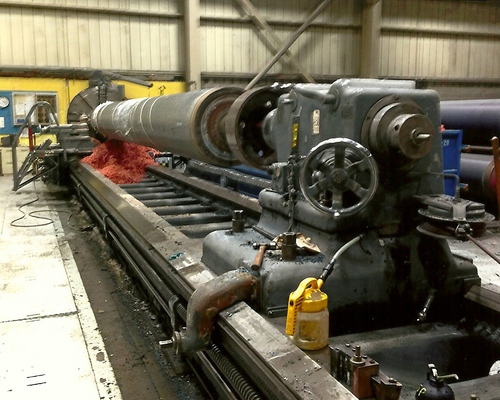 Large Leblond lathe turning a paper mill roll